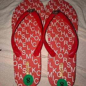 Brand new Michael kors flip flops